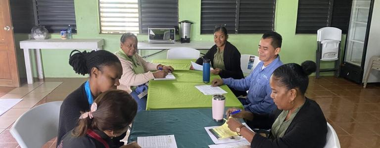 People sitting around a table chatting