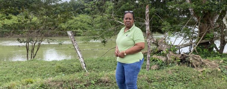 Woman standing near a lake