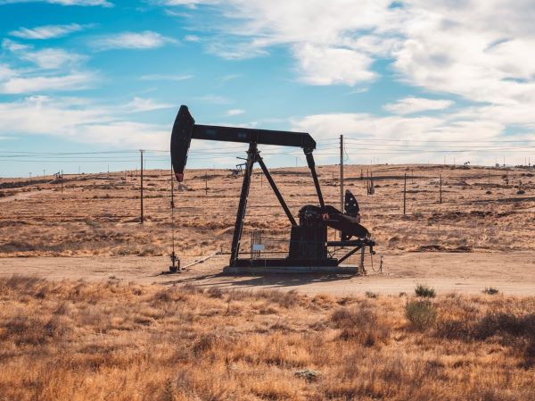 Orphan well in a field during daylight